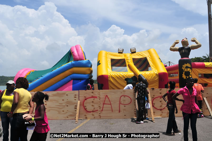 Lucea Cross the Harbour @ Lucea Car Park - All Day Event - Cross the Harbour Swim, Boat Rides, and Entertainment for the Family - Concert Featuring: Bushman, George Nooksl, Little Hero, Bushi One String, Dog Rice and many local Artists - Friday, August 1, 2008 - Lucea, Hanover Jamaica - Photographs by Net2Market.com - Barry J. Hough Sr. Photojournalist/Photograper - Photographs taken with a Nikon D300 - Negril Travel Guide, Negril Jamaica WI - http://www.negriltravelguide.com - info@negriltravelguide.com...!