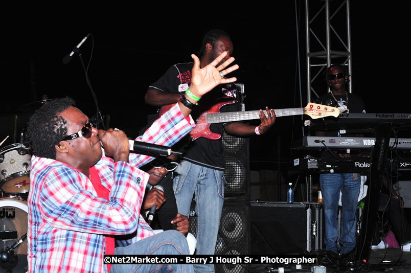 Lucea Cross the Harbour @ Lucea Car Park - All Day Event - Cross the Harbour Swim, Boat Rides, and Entertainment for the Family - Concert Featuring: Bushman, George Nooksl, Little Hero, Bushi One String, Dog Rice and many local Artists - Friday, August 1, 2008 - Lucea, Hanover Jamaica - Photographs by Net2Market.com - Barry J. Hough Sr. Photojournalist/Photograper - Photographs taken with a Nikon D300 - Negril Travel Guide, Negril Jamaica WI - http://www.negriltravelguide.com - info@negriltravelguide.com...!