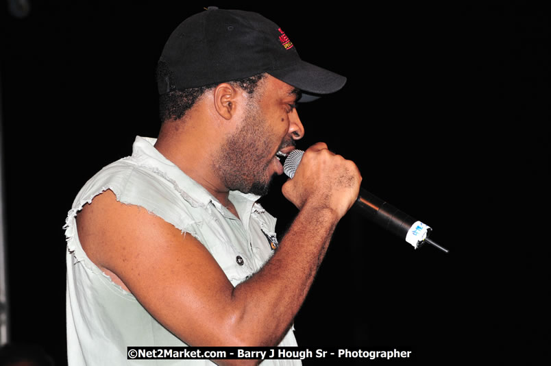 Lucea Cross the Harbour @ Lucea Car Park - All Day Event - Cross the Harbour Swim, Boat Rides, and Entertainment for the Family - Concert Featuring: Bushman, George Nooksl, Little Hero, Bushi One String, Dog Rice and many local Artists - Friday, August 1, 2008 - Lucea, Hanover Jamaica - Photographs by Net2Market.com - Barry J. Hough Sr. Photojournalist/Photograper - Photographs taken with a Nikon D300 - Negril Travel Guide, Negril Jamaica WI - http://www.negriltravelguide.com - info@negriltravelguide.com...!