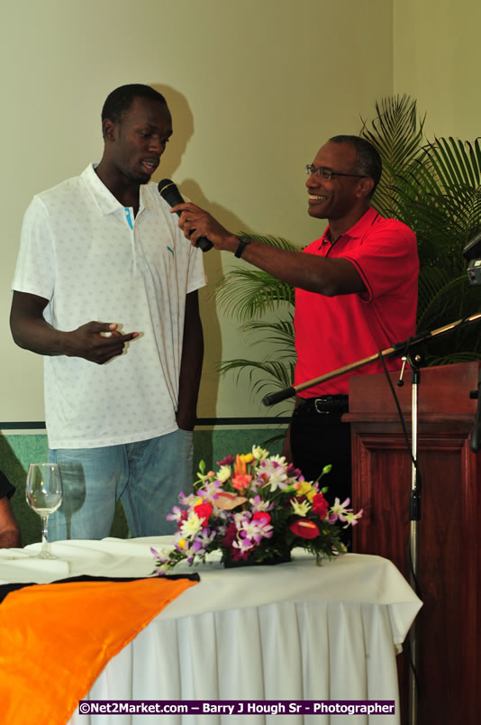 Usain Bolt of Jamaica - The Fastest Man In The World  - Usain Bolt Homecoming Celebrations - Press Conference at the Grand Bahia Principe &amp; Sherwood Content - Waldensia Primary School - Photographs by Net2Market.com - Barry J. Hough Sr. Photojournalist/Photograper - Photographs taken with a Nikon D300 - Negril Travel Guide, Negril Jamaica WI - http://www.negriltravelguide.com - info@negriltravelguide.com...!